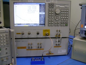 Abracon's Sync'n Go hooked up to an Agilent E5052A Signal Source Analyzer