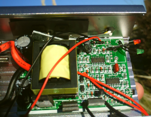 Close up view of the circuitry revealing several safety issues