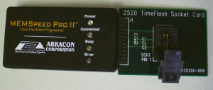 Close-up of the MEMSpeed Pro II programmer and the adapter card with opened socket