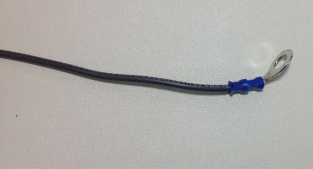 Ring-terminal crimped onto the end of the wire