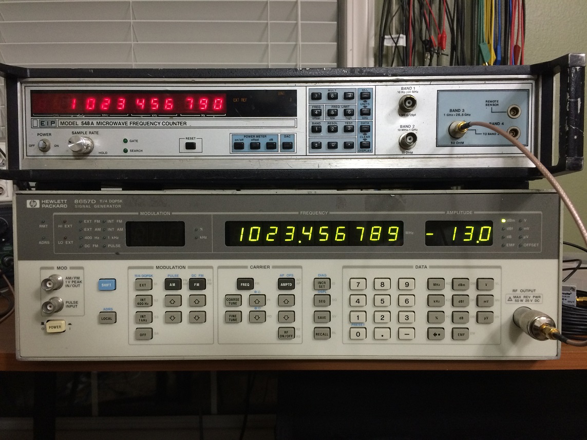 HP8657D Signal Generator and EIP548A Frequency Counter Synchronized