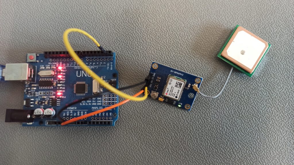 uBlox NEO-6 GPS module connected to an Arduino Uno for dynamic Timepulse 5 setting.