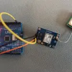 uBlox NEO-6 GPS module connected to an Arduino Uno for dynamic Timepulse 5 setting.