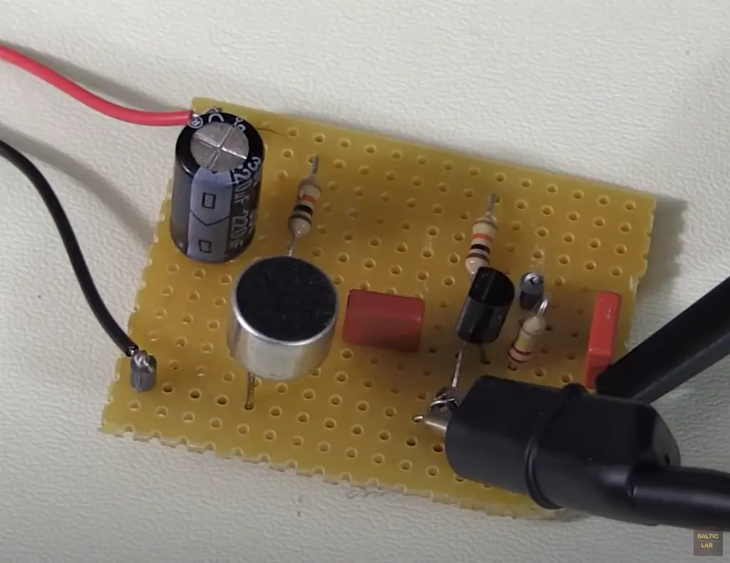 Functional microphone Preamplifier circuit on a small piece of perfboard.