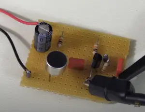 Functional microphone Preamplifier circuit on a small piece of perfboard.