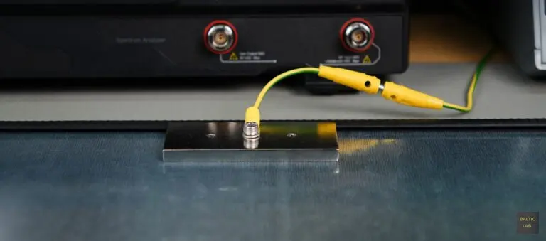 Reference ground plane bonded to earth ground