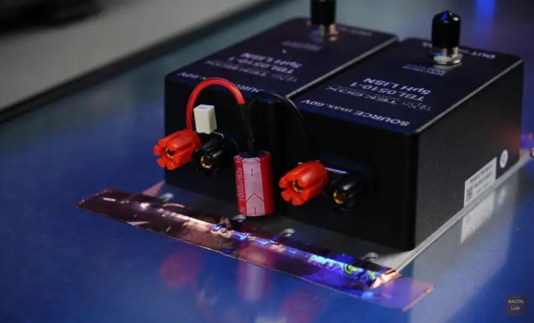 LISNs with a factory-installed 1 µF capacitor on the positive supply line LISN (left) and an externally installed 1000 µF capacitor on the ground-return LISN (right)